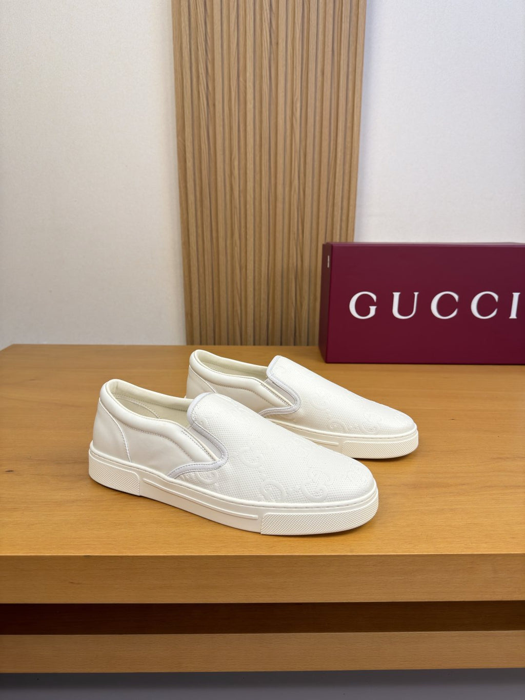Ivory White Embossed Slip-On Sneakers