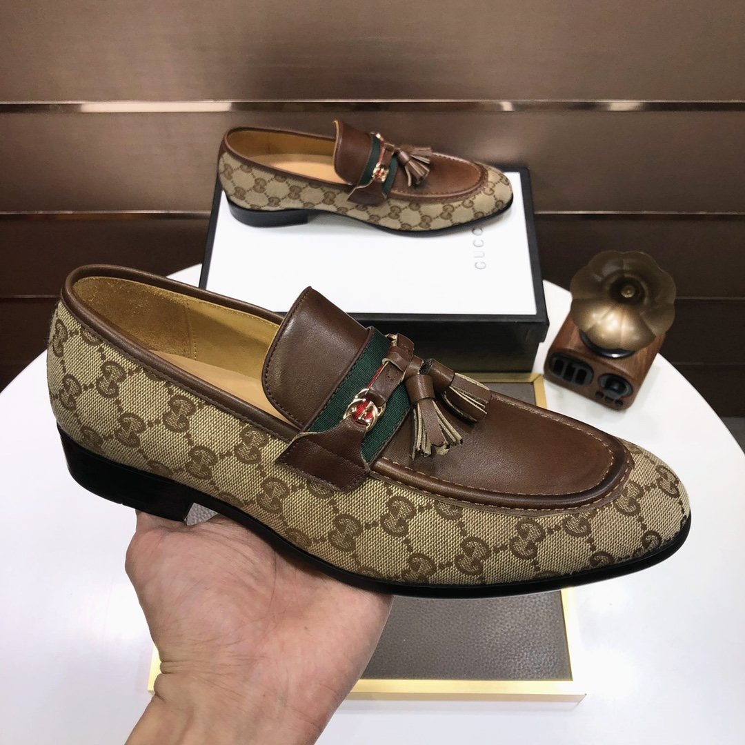 Gucci Monogram Tassel Loafers