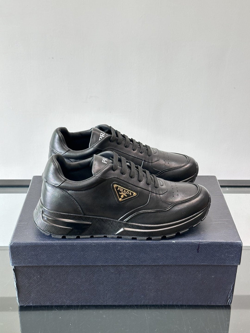 Prada Men's Triangle Plaque Low-Top Sneakers - Thick Lug Sole