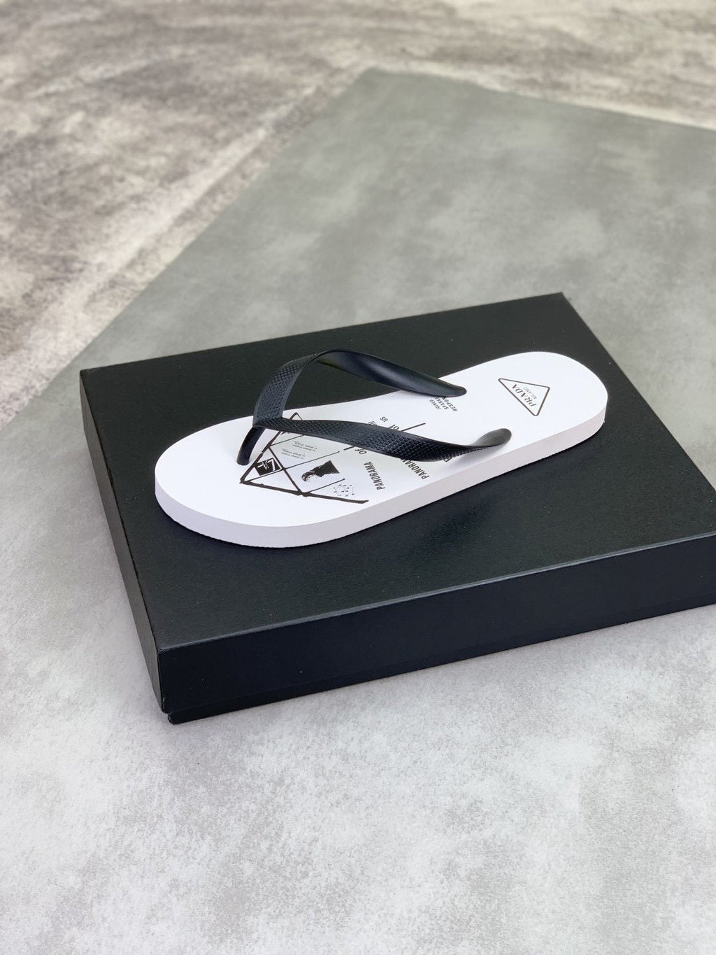 Prada Black Strap White Flip Flops