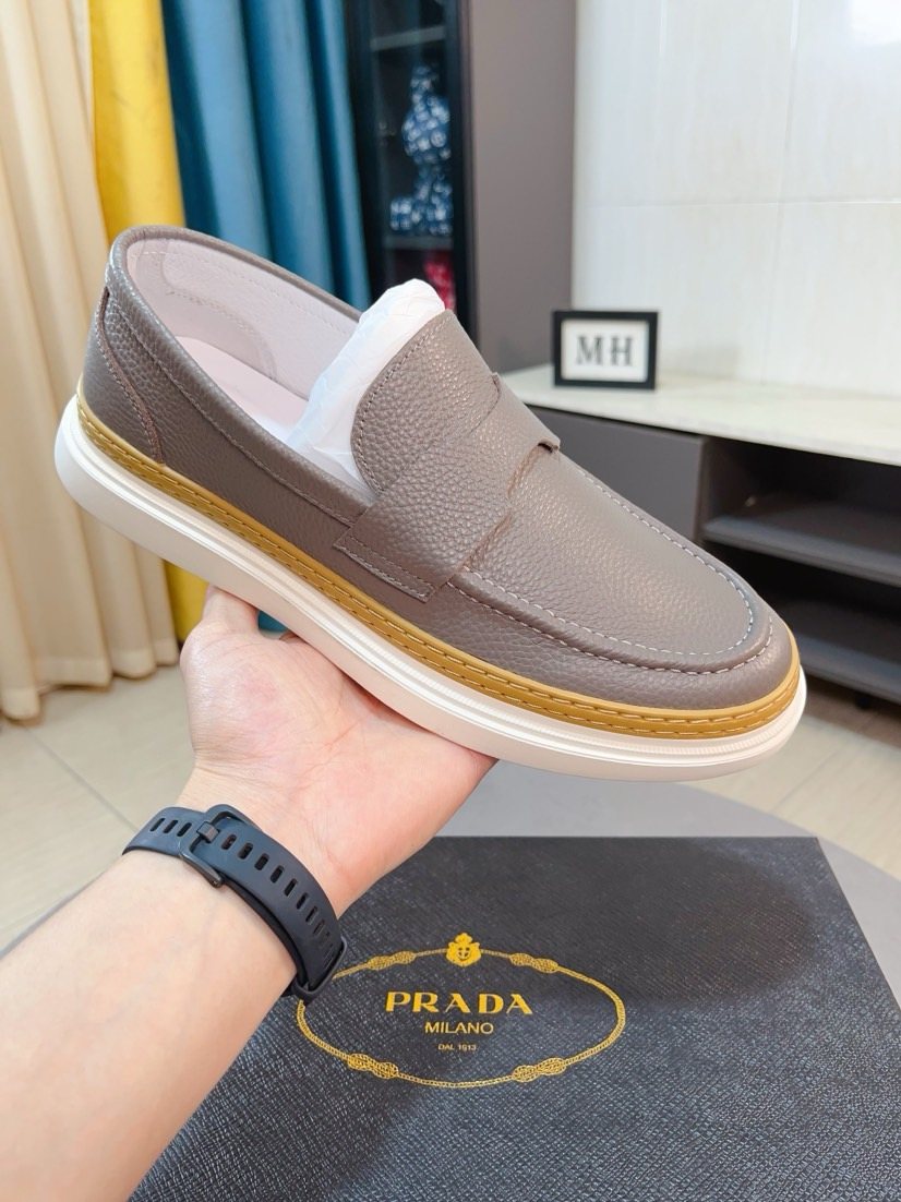 Prada Textured Slip-On Shoes